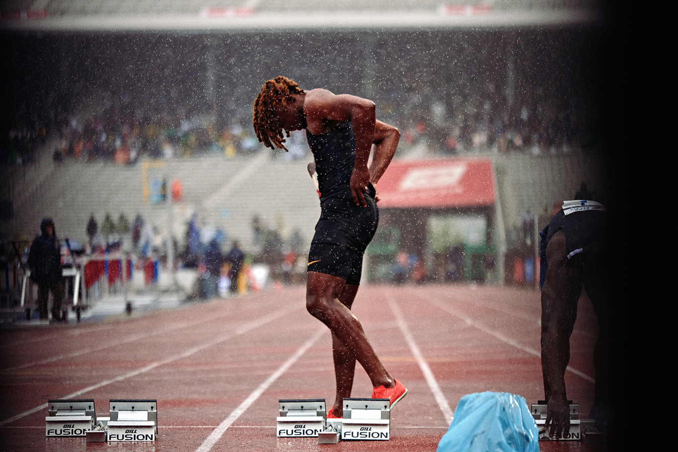 Penn Relays: Depth of Field in a Downpour
