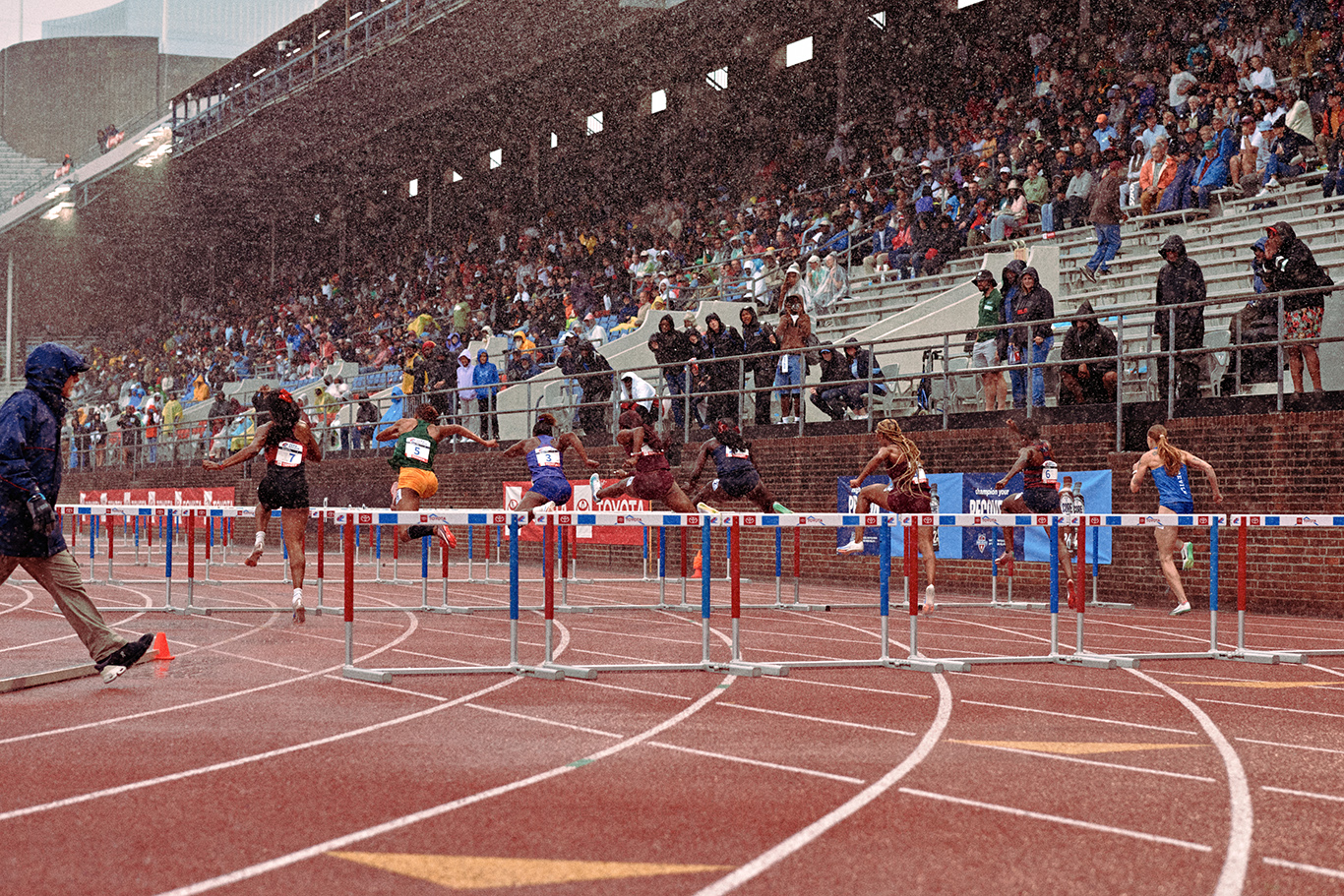 Penn Relays: Depth of Field in a Downpour