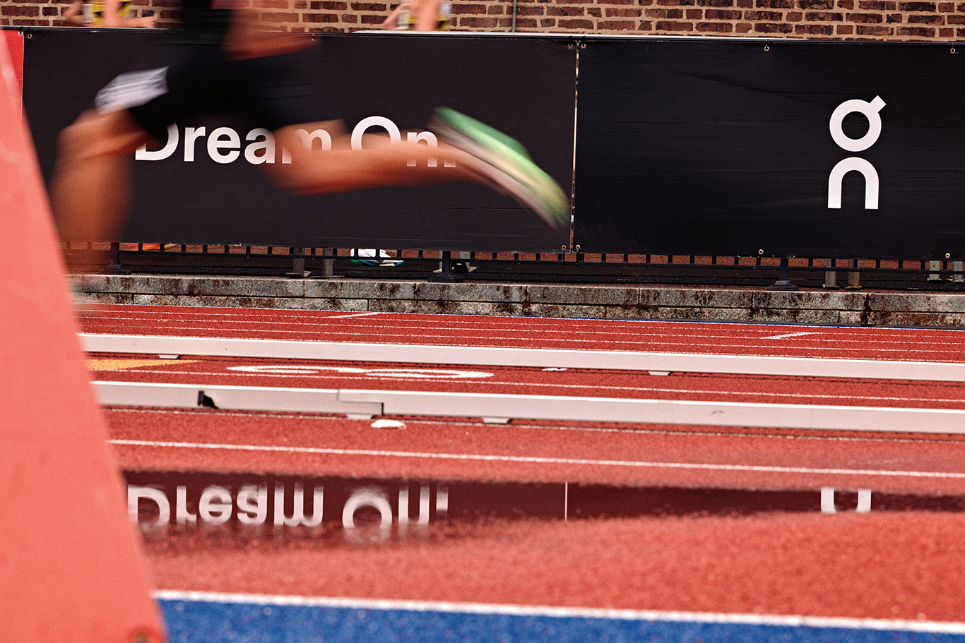 Penn Relays: Depth of Field in a Downpour