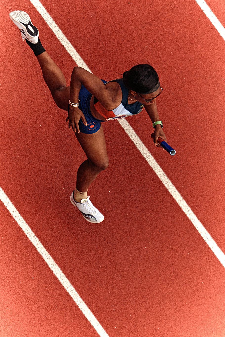 Penn Relays: Depth of Field in a Downpour