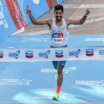 Talbi soars to new course record as Belayneh's late surge wins the Houston Marathon